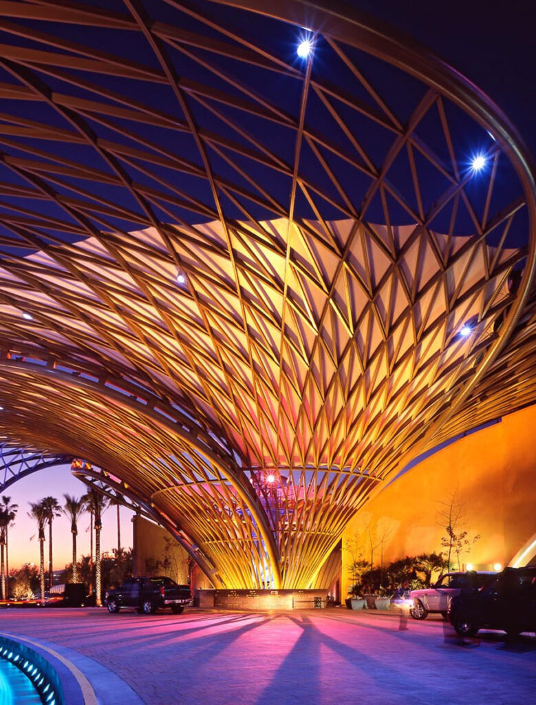 Driveway entrance of Morongo Casino Resort & Spa with cars out front.